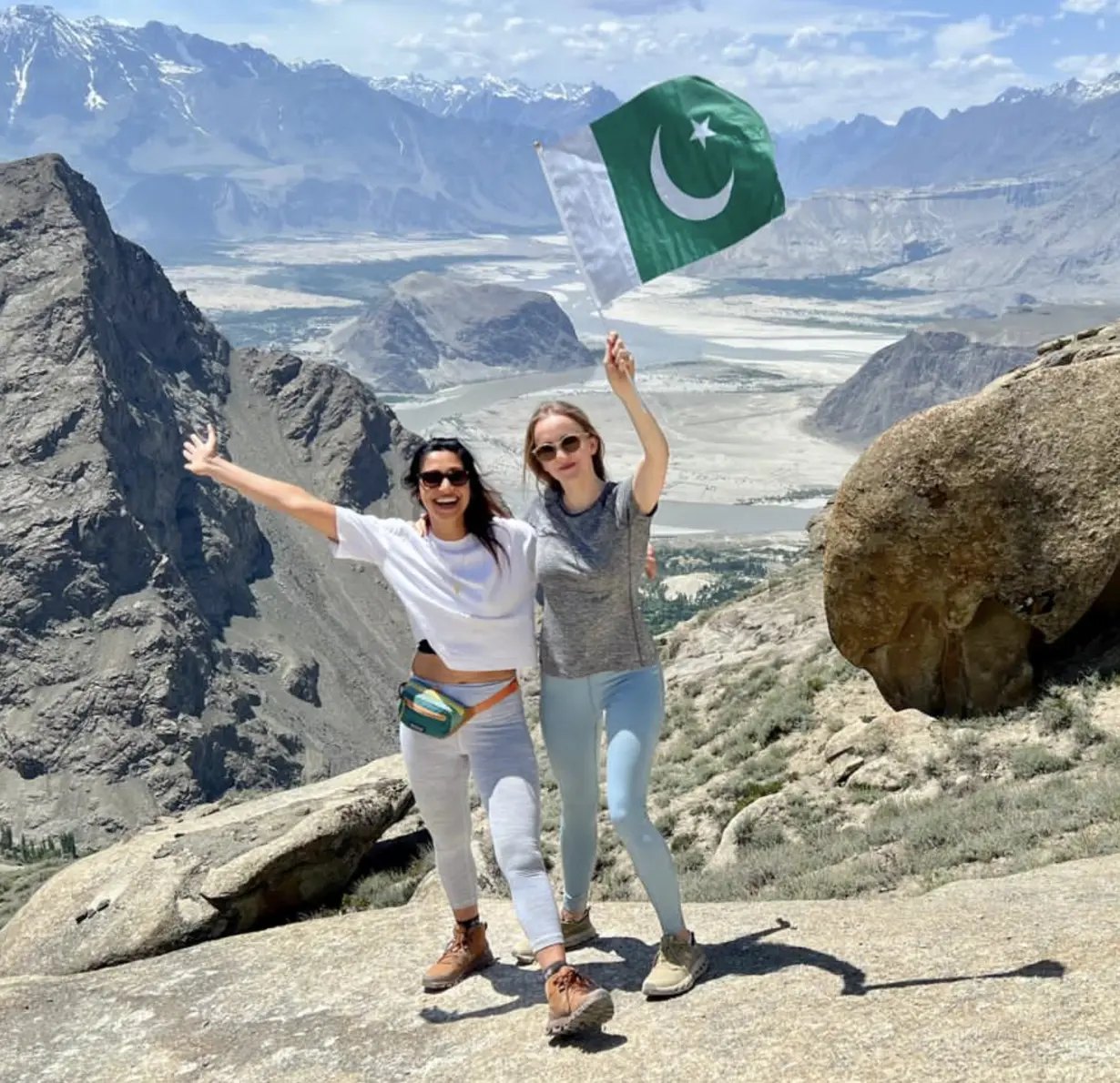 Travelers celebrating on a Skardu viewpoint