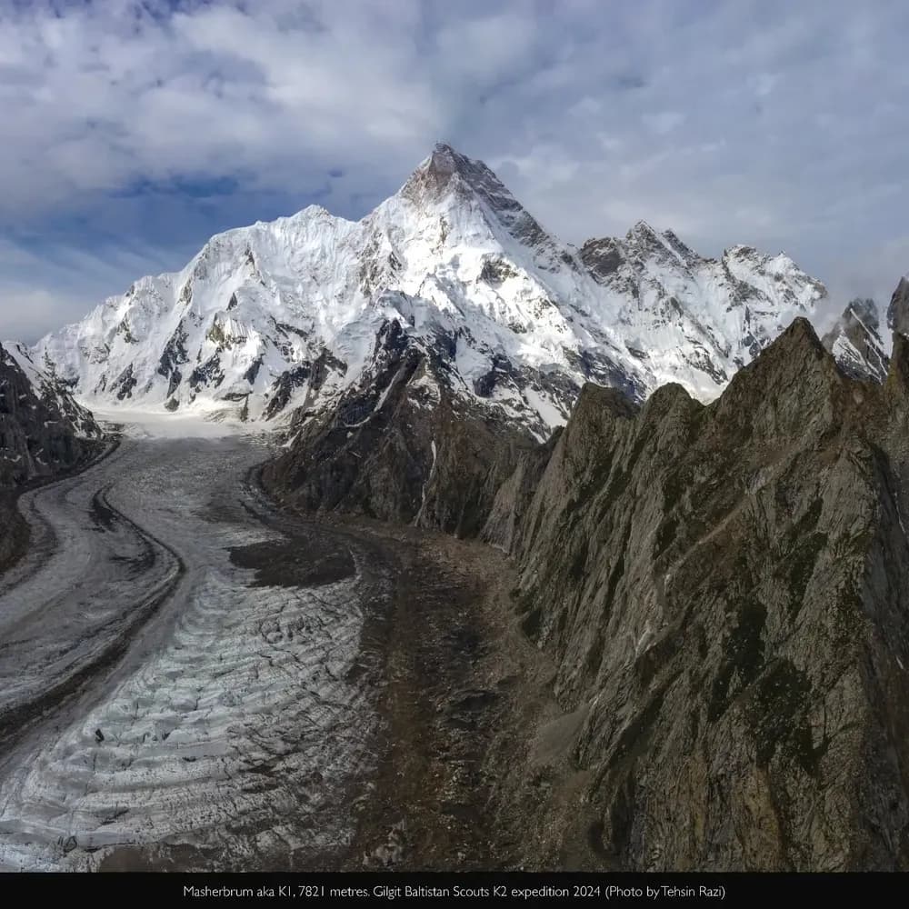 Snow-covered Karakoram peaks above a glacier at Concordia