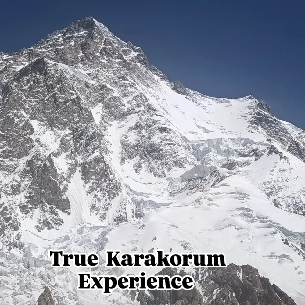 A high Karakoram peak under cloud