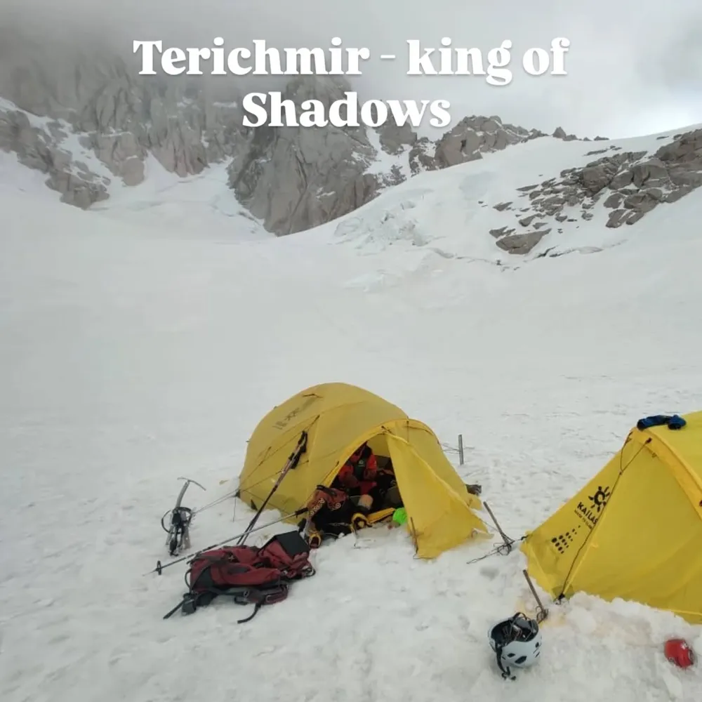 Yellow expedition tents pitched below Terichmir